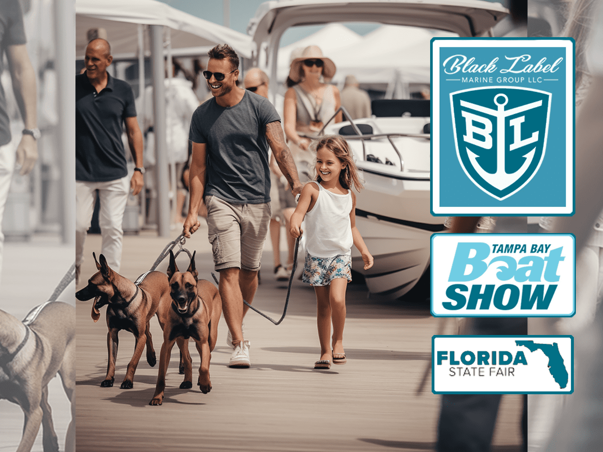 tampa-boat-show-tampa-fairgrounds-father-daughter-and-two-dogs-walking-around
