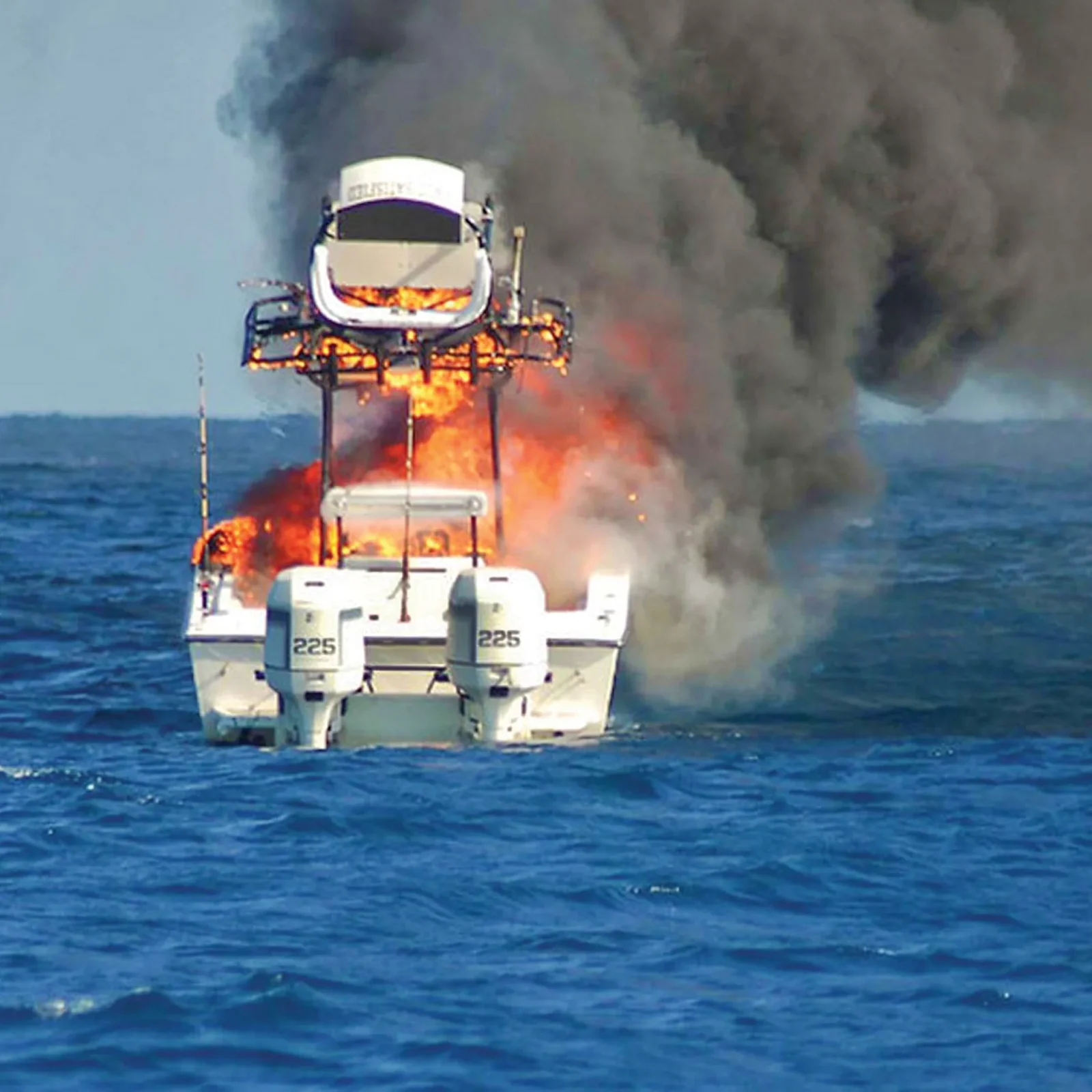 center-console-fishing-boat-on-fire