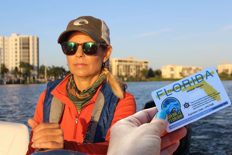 photo of a women and a boat license 