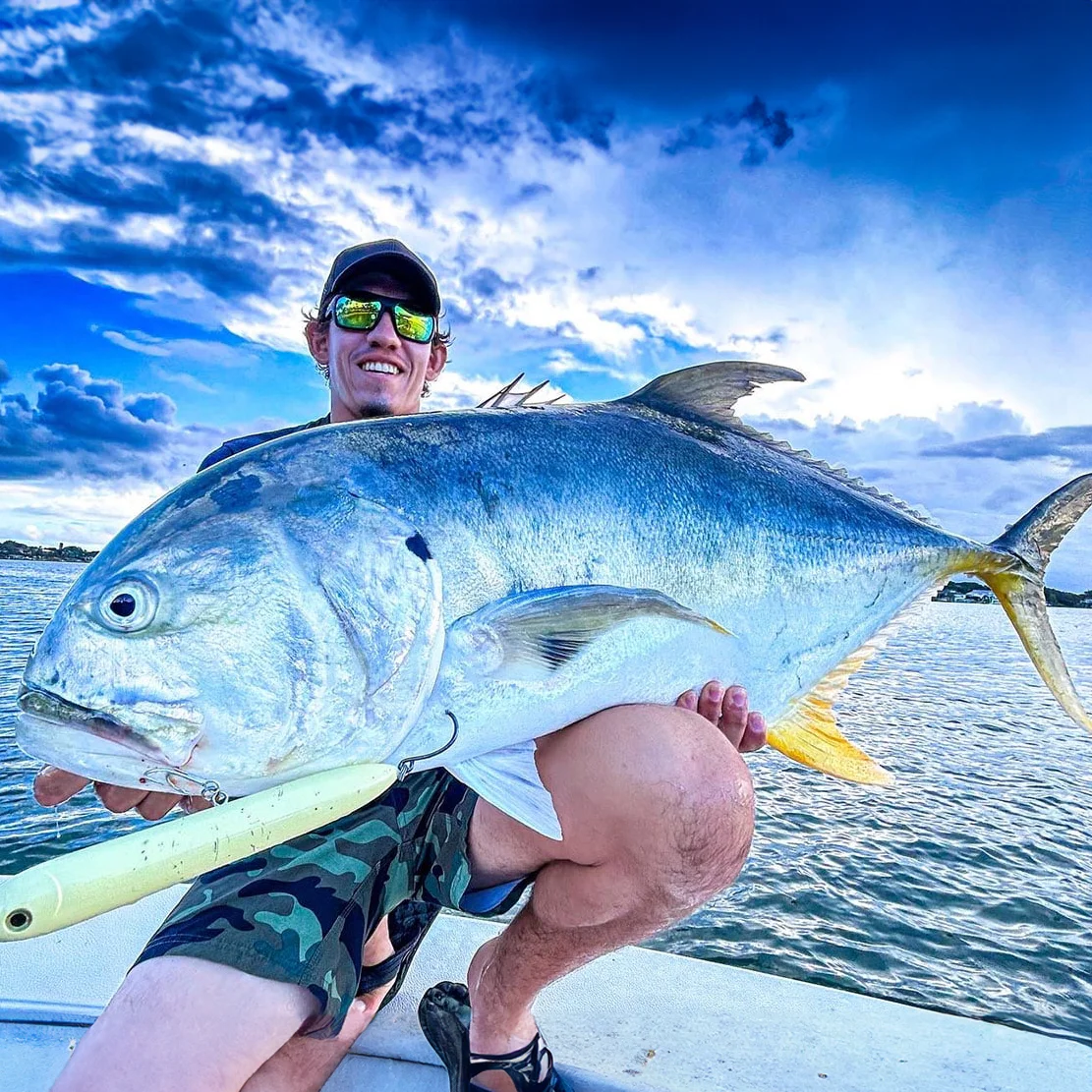 man holding jack crevalle