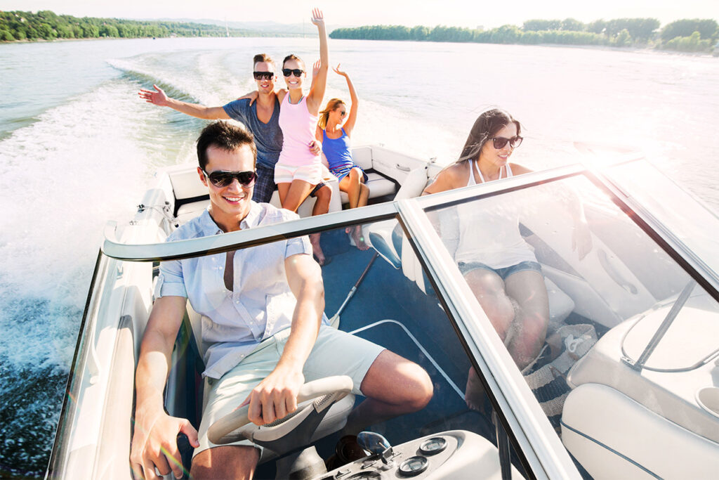 Family enjoying music zones with family boat upgrades on open water